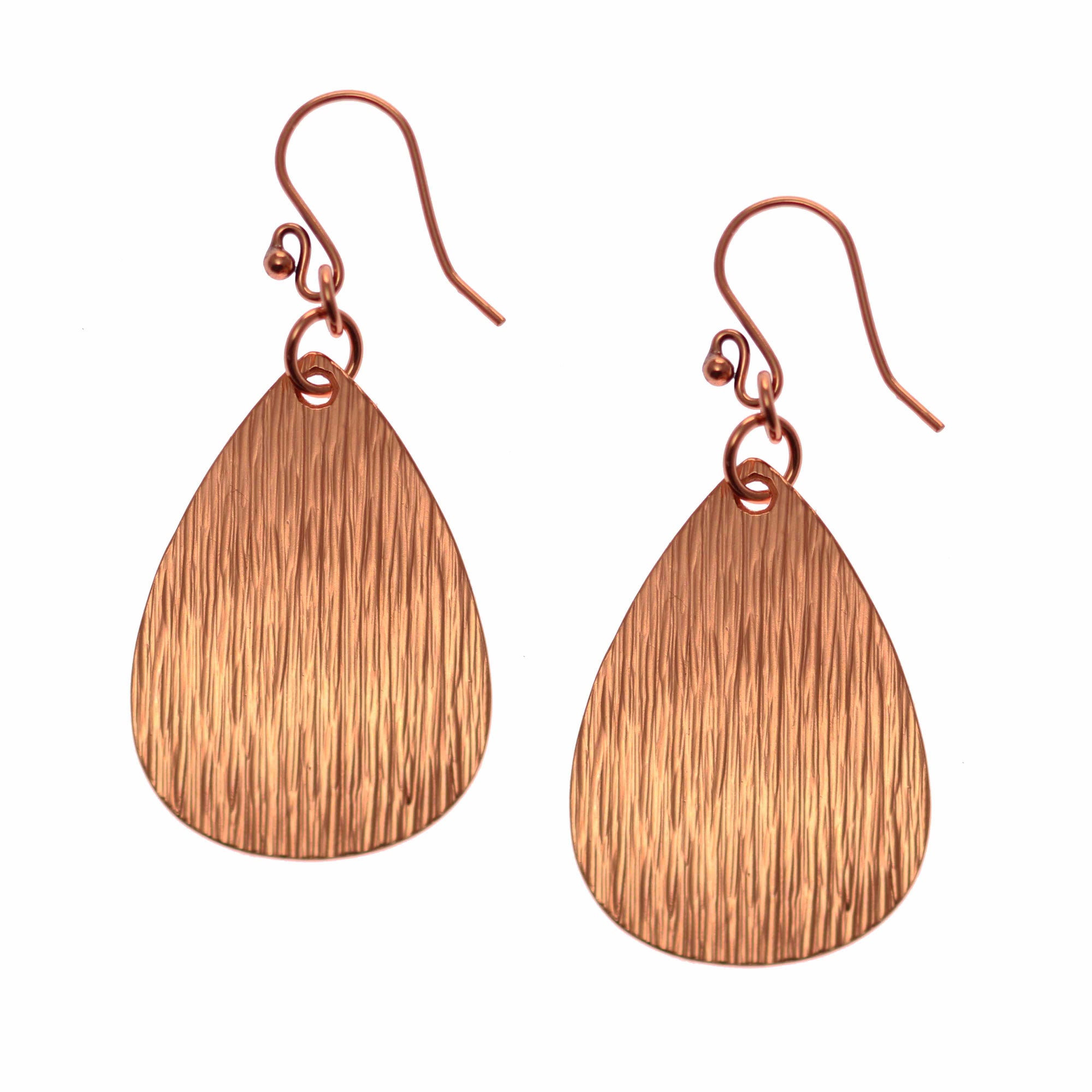 A Pair of Medium Bark Embossed Copper Teardrop Earrings on a White Background