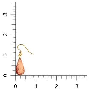 5 of 7: Mini Hammered Copper Teardrop Earring shown beside an inch ruler for scale. The earring measures about 1 1/2 inches in total length and features a petite hammered copper teardrop suspended from a brass French ear wire. The ruler helps show the compact size and slim proportions.