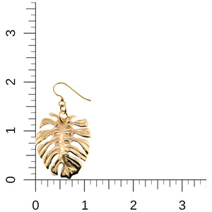 5 of 6: Monstera Nu Gold Brass Leaf Earrings on a Ruler for Size Dimensions