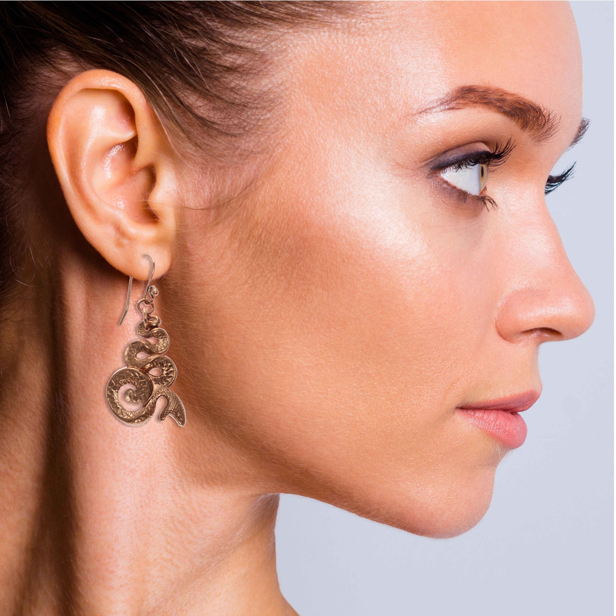 Fashionable Woman Wearing Mystic Snake Copper Drop Earrings