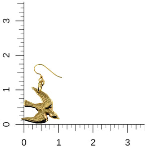 5 of 7: Nu Gold Brass Flying Swallow Earring on a ruler for scale
