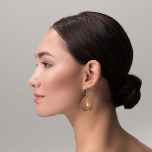 6 of 7: Fashionable Woman Wearing Ornate Mandala Teardrop Copper Earrings 