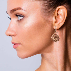 6 of 7: Fashionable Woman Wearing Paisley Burst Copper Drop Earrings
