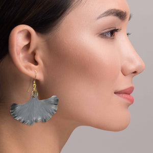 2 of 7: Elegant Woman Wearing Pewter Gray Anodized Aluminum Medium Ginkgo Leaf Earrings