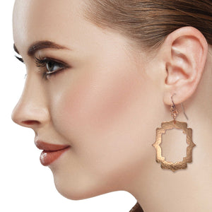 2 of 7: Stunning Female Wearing Pierced Hammered Copper Arabesque Shield Earrings
