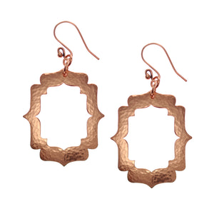 1 of 7: A Pair of Pierced Hammered Copper Arabesque Shield Earrings on a White Background