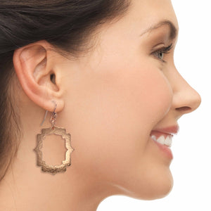 4 of 7: Stylish Woman With Pierced Hammered Copper Arabesque Shield Earrings