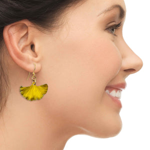 4 of 7: A Chic Woman Wearing Small Canary Yellow Anodized Aluminum Ginkgo Leaf Earrings