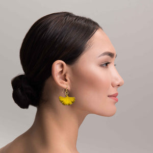 6 of 7: An Elegant Woman Wearing Small Canary Yellow Anodized Aluminum Ginkgo Leaf Earrings