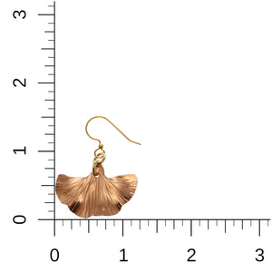 5 of 7: Small Copper Ginkgo Leaf Earrings on Ruler for Size Dimensions