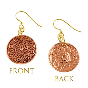 3 of 8: Front and back views of a Small Copper Mandala Disc Earring on a white background. The front shows the raised swirling mandala design on a round copper disc, while the back shows the reverse of the stamped pattern. A brass French ear wire and connecting rings complete the earring.