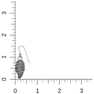 5 of 8: A small aluminum feather dangle earring is shown next to a measurement grid with inch markings on the left and bottom edges. The earring hangs from a stainless steel French ear wire and measures a little over 1 inch in length. The feather charm has textured detailing and appears lightweight against the plain white background.