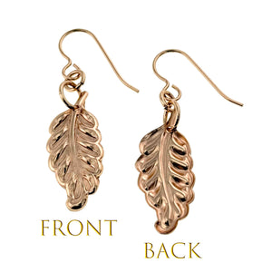 3 of 7: Front and back view of John S. Brana's handcrafted Small Feather Bronze Dangle Earrings, showcasing detailed die-struck feather design and polished finish.