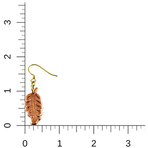 4 of 7: Small Feather Copper Dangle Earring with a ruler for scale on a white background