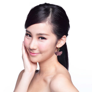 6 of 8: Elegant Woman Wearing Small Mauve Ginkgo Leaf Anodized Aluminum Purple Earrings