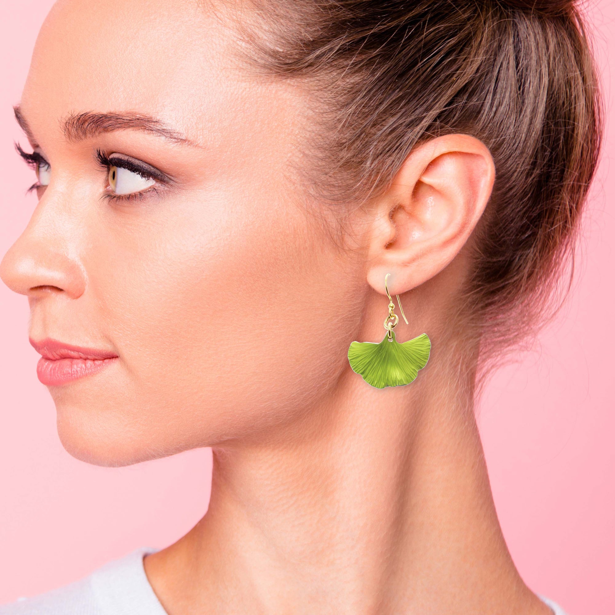 Side Profile of Beautiful Women Wearing Small Ginkgo Leaf Anodized Aluminum Sour Candy Apple Earrings