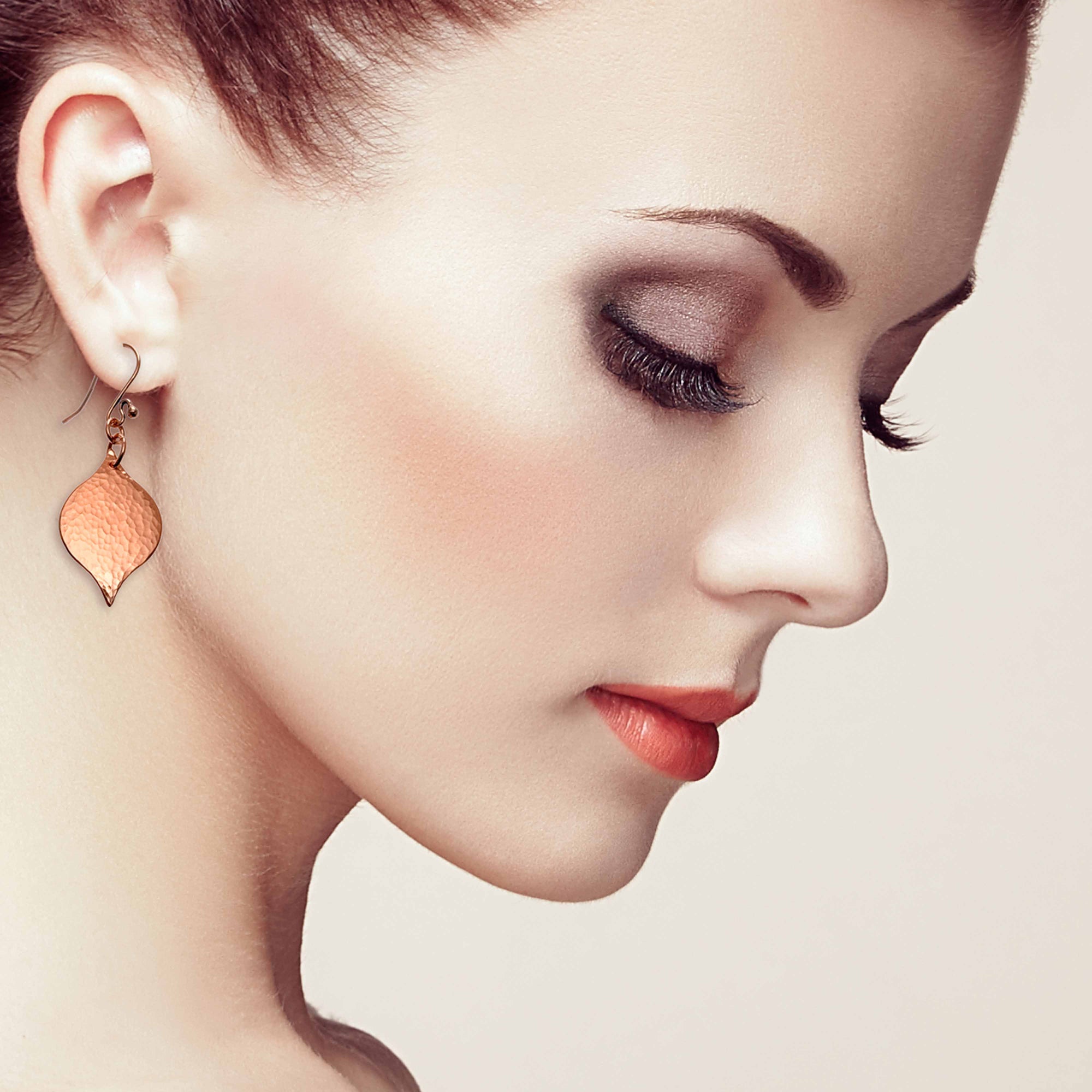 An Elegant Woman Wearing Small Hammered Copper Marrakesh Drop Earrings