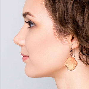 6 of 7: A Chic Woman Wearing Small Hammered Copper Quatrefoil Dangle Earrings