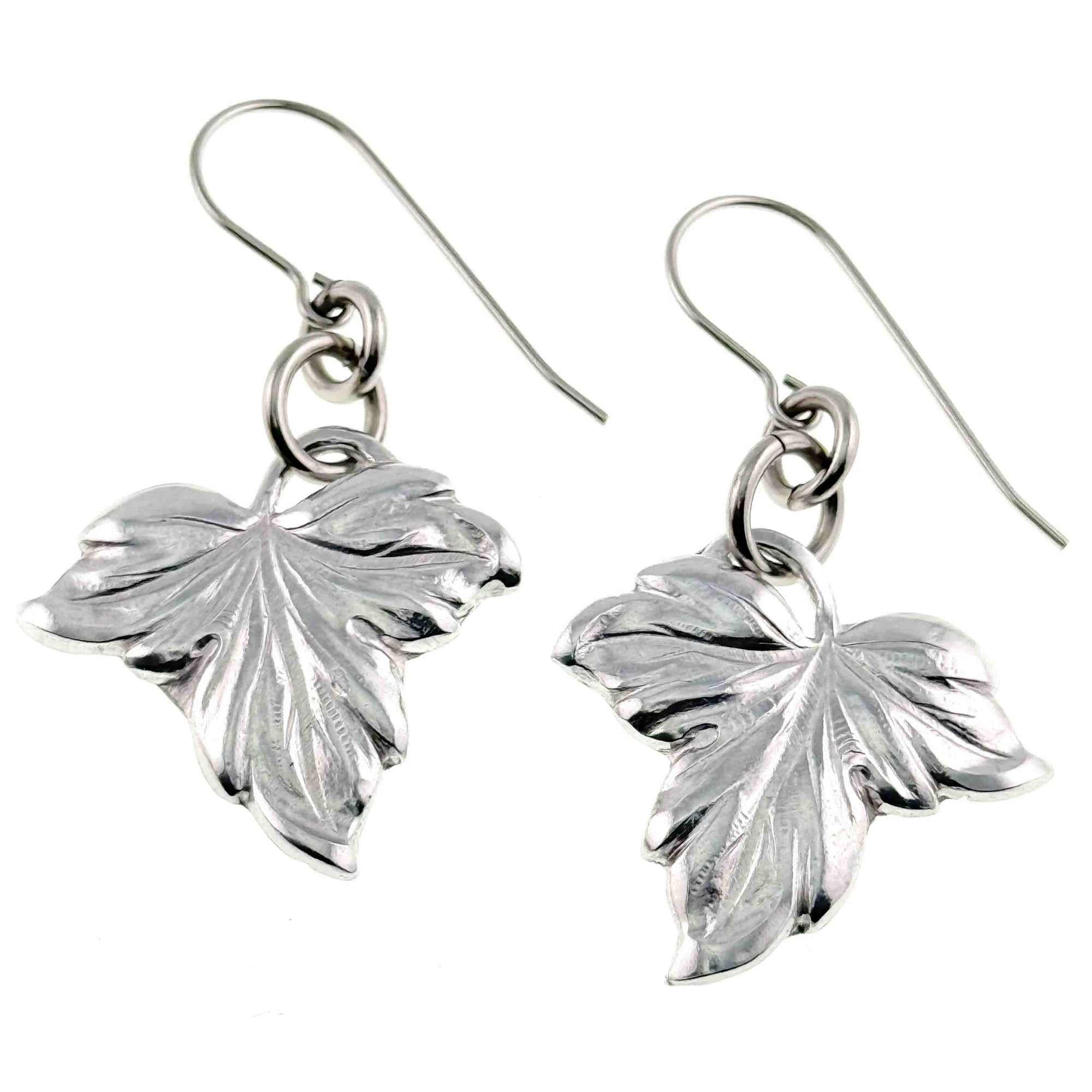 Small Maple Leaf Aluminum Dangle Earrings on a white background
