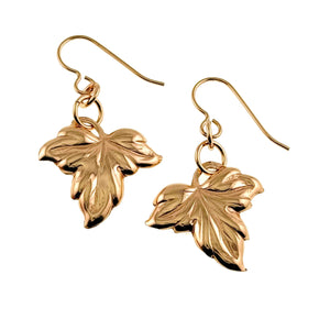 1 of 7: Small Maple Leaf Bronze Dangle Earrings on a white background