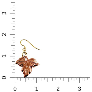 5 of 7: Small Maple Leaf Copper Dangle Earrings on a ruler for scale