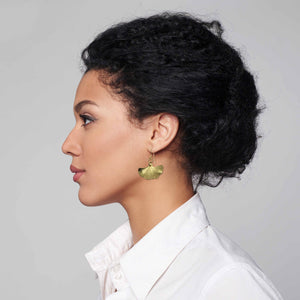 4 of 7: Woman in White Blouse Wearing Small Nu Gold Brass Ginkgo Leaf Earrings