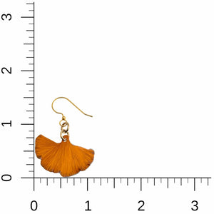 5 of 7: Small Orange Anodized Aluminum Ginkgo Leaf Earrings on a Ruler for Size Dimensions