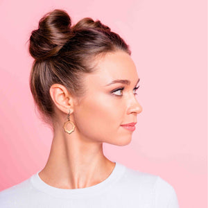 2 of 6: A Fashionable Woman Wearing Small Pierced Hammered Copper Arabesque Flower