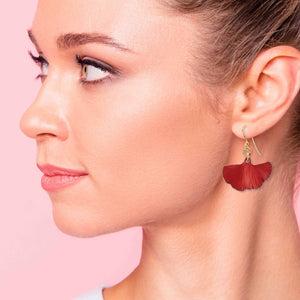 2 of 7: A Fashionable Woman Wearing Small Red Ginkgo Leaf Anodized Aluminum Earrings 