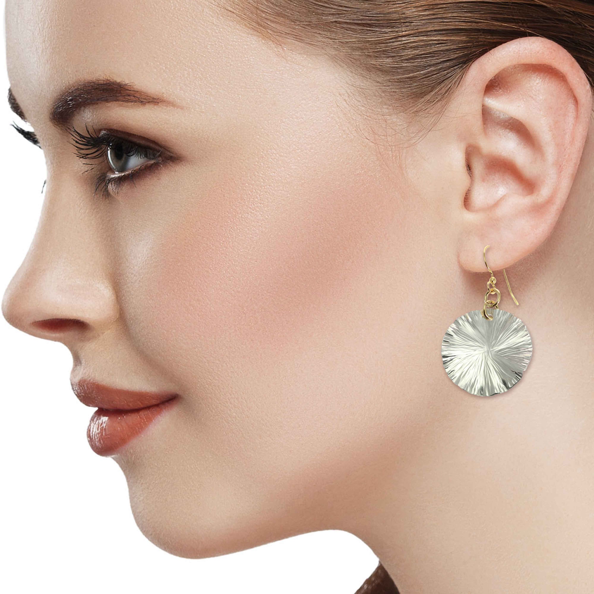 A Stunning Woman Wearing Small Aluminum Lily Pad Leaf Drop Earrings