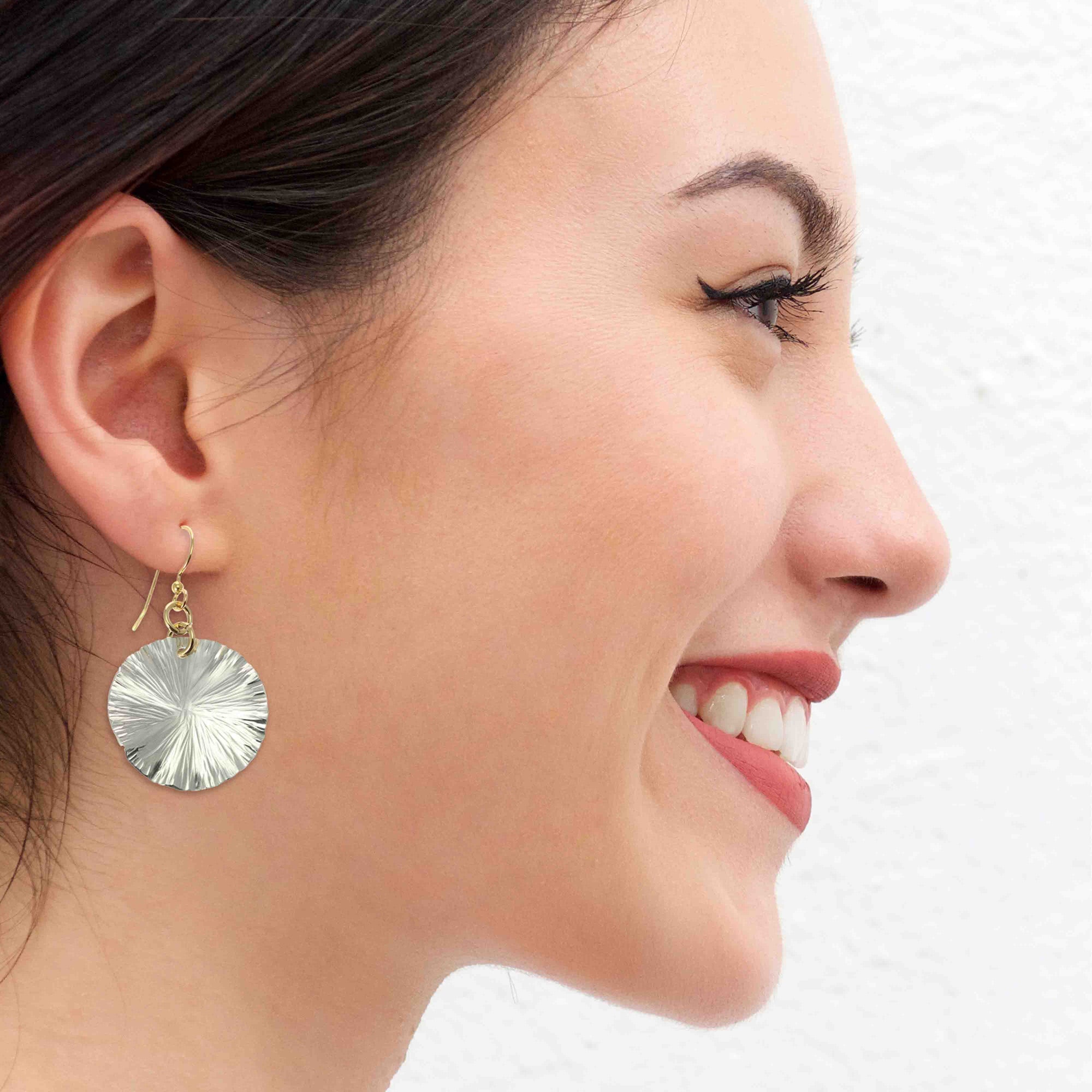 A Stylish Woman Wearing Small Aluminum Lily Pad Leaf Drop Earrings