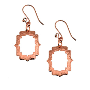 1 of 7: A Pair of Small Pierced Hammered Copper Arabesque Shield Earrings on a White Background