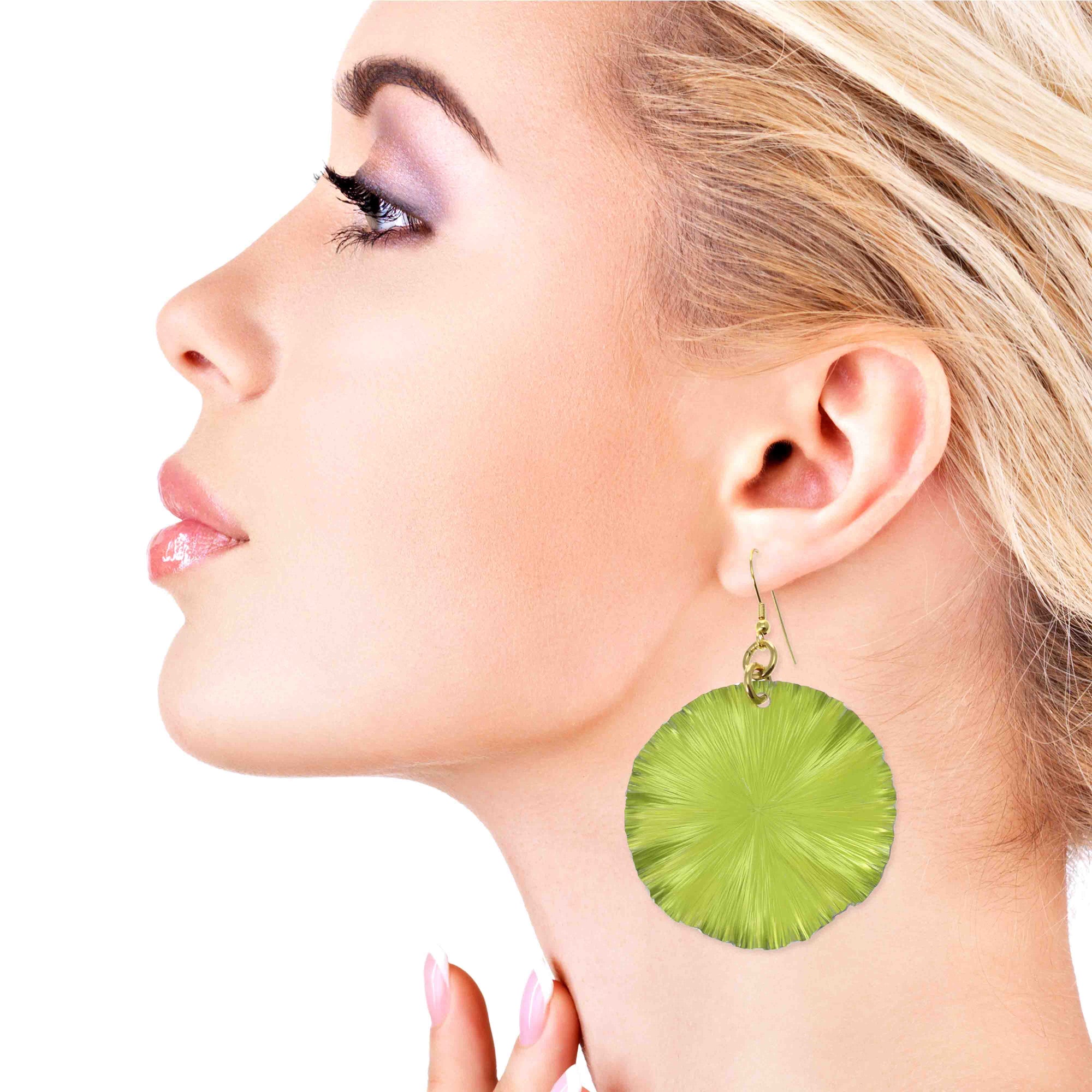 A Stunning Woman Wearing Sour Candy Apple Anodized Aluminum Large Lily Pad Earrings