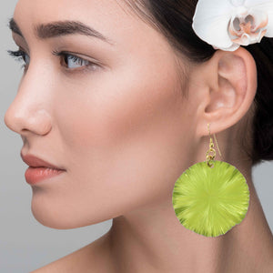 6 of 7: An Elegant Woman Wearing Sour Candy Apple Anodized Aluminum Large Lily Pad Earrings
