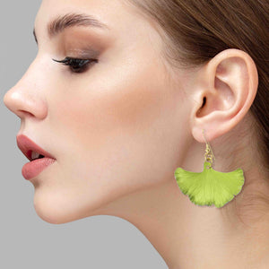 2 of 7: An Elegant Woman Wearing Medium Sour Candy Apple Anodized Aluminum Ginkgo Leaf Earrings