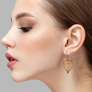 2 of 7: Elegant Woman Wearing Victorian Copper Heart Leaf Drop Earrings