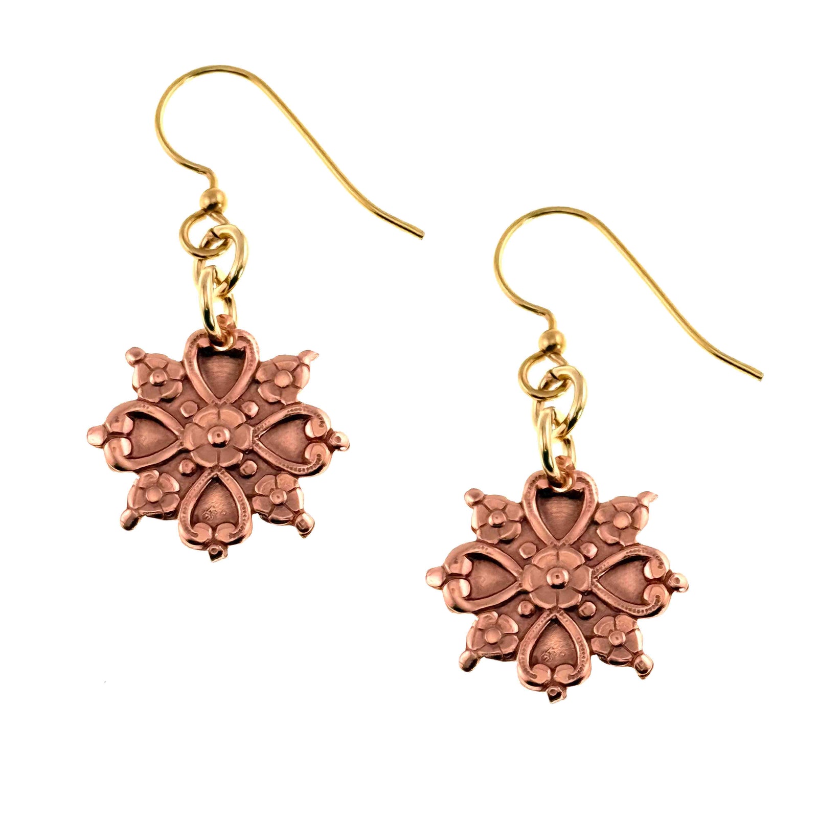 Pair of Victorian Copper Snowflake Dangle Earrings on gold hooks against a white background
