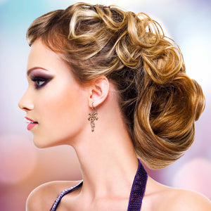 6 of 7: Stunning Woman Wearing Yuletide Ribbon Copper Dangle Earrings