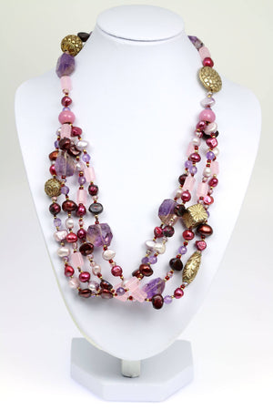 1 of 5: An Amethyst Rose Quartz Beaded Gemstone Necklace on a White Neck Display