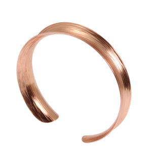 2 of 7: Side View of Anticlastic Bark Copper Bangle Bracelet