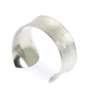 2 of 7: Side View Anticlastic Tapered Linen Aluminum Bangle Bracelet