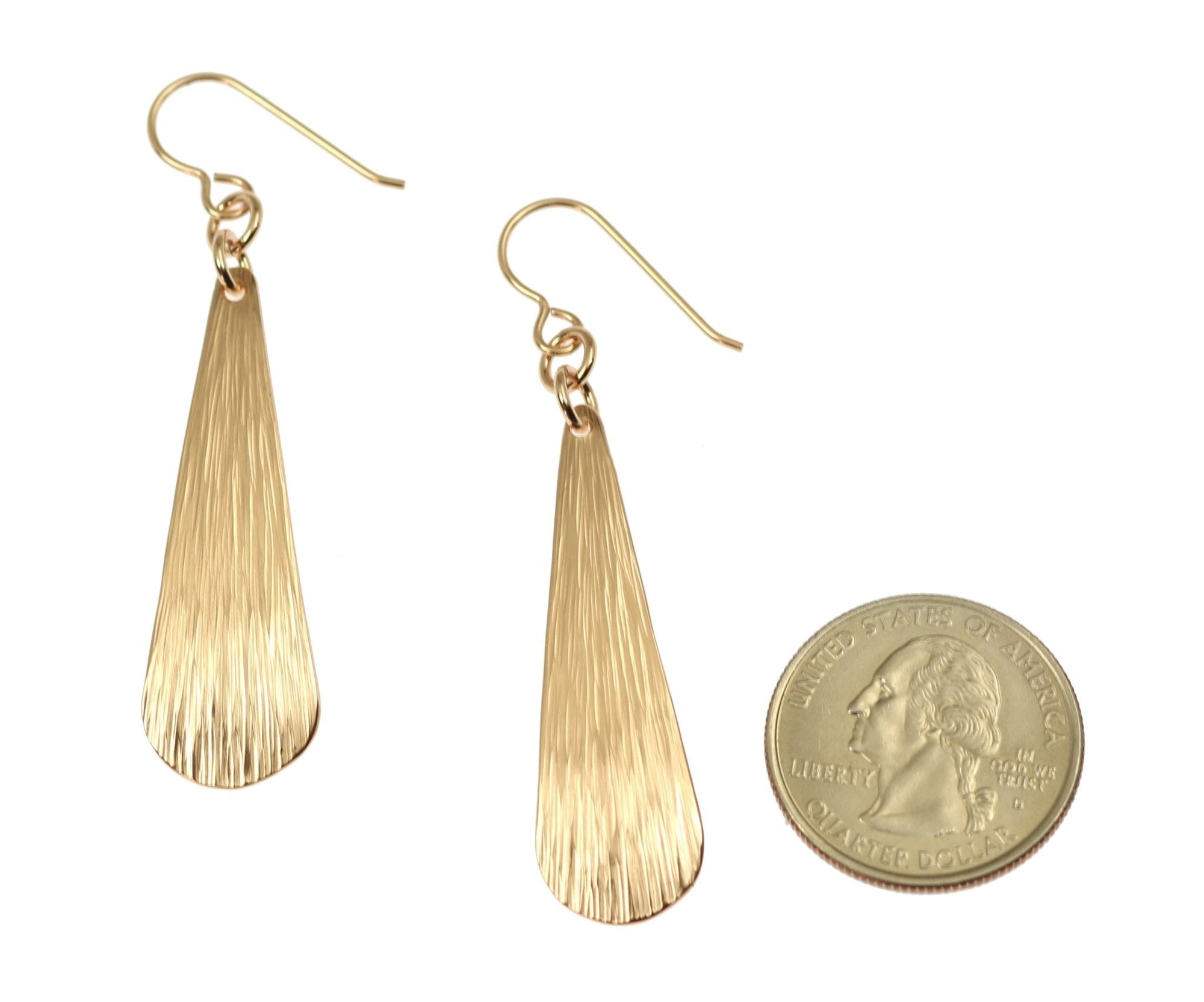 Size of Bronze Bark Long Teardrop Earrings compared to a US Quarter Coin