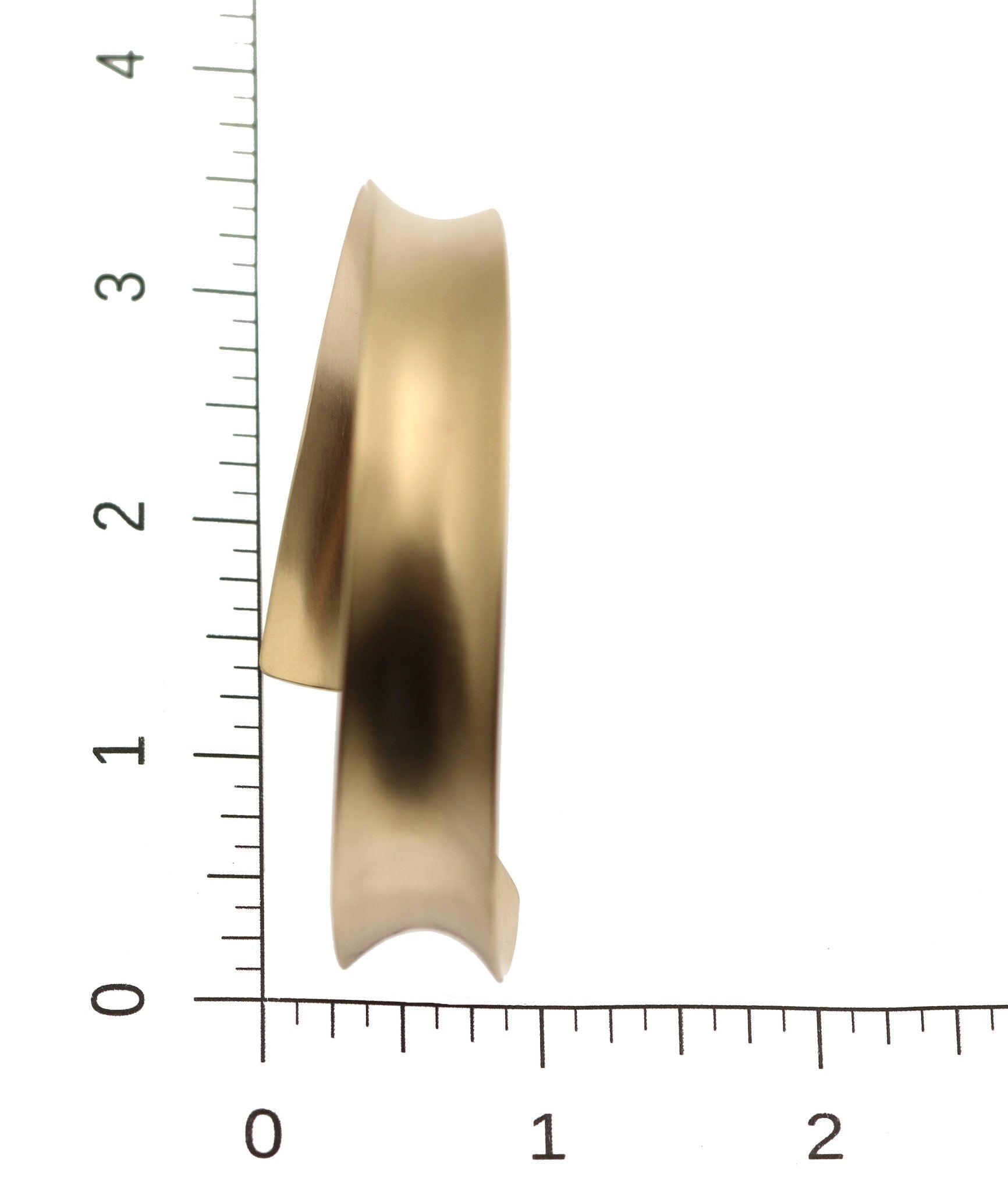 Brushed Bronze Anticlastic Bangle Bracelet on a Ruler for Size Dimensions