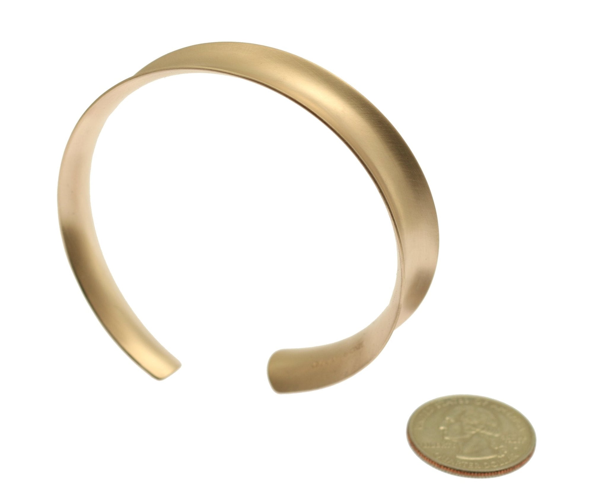 Width of Brushed Bronze Anticlastic Bangle Bracelet compared to a US Quarter Coin