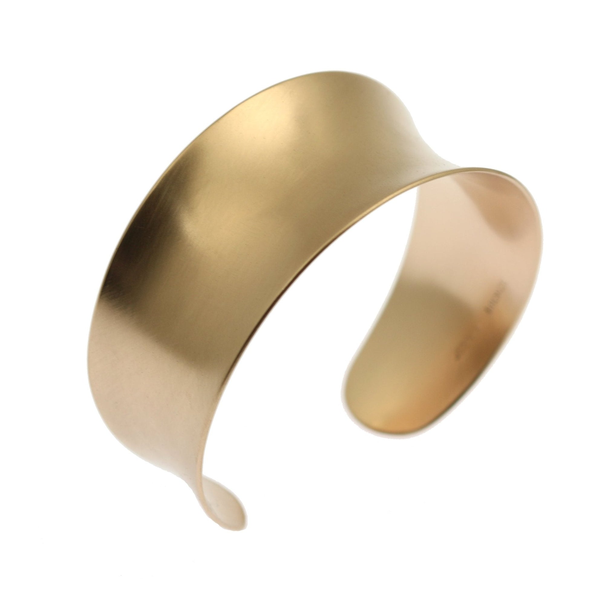 A Brushed Bronze Anticlastic Cuff on a White Background