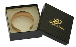 9 of 9: Brushed Bronze Anticlastic Cuff in Black Gift Box with Gold Logo