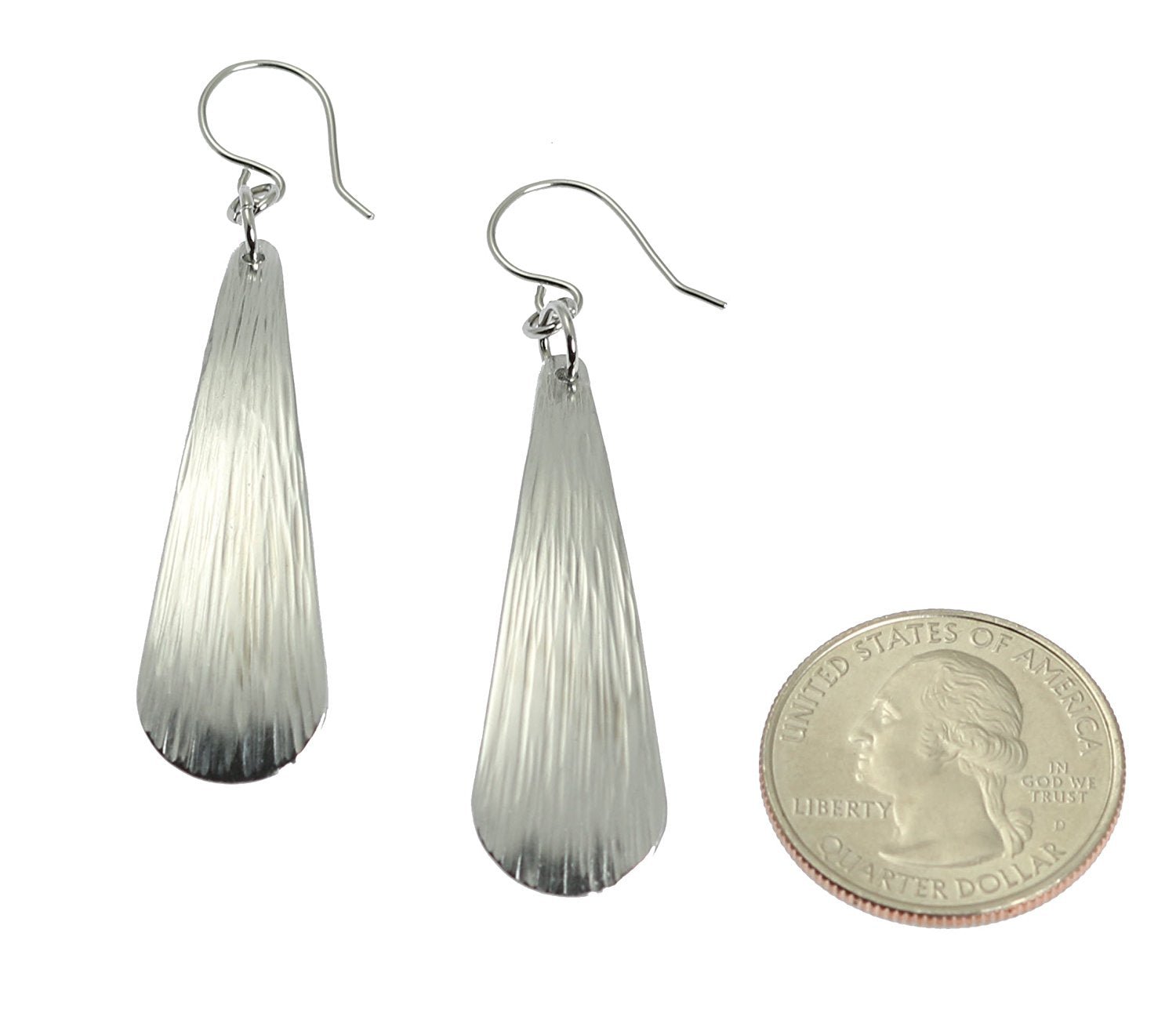 Size of Chased Aluminum Long Teardrop Earrings compared with a US Quarter Coin
