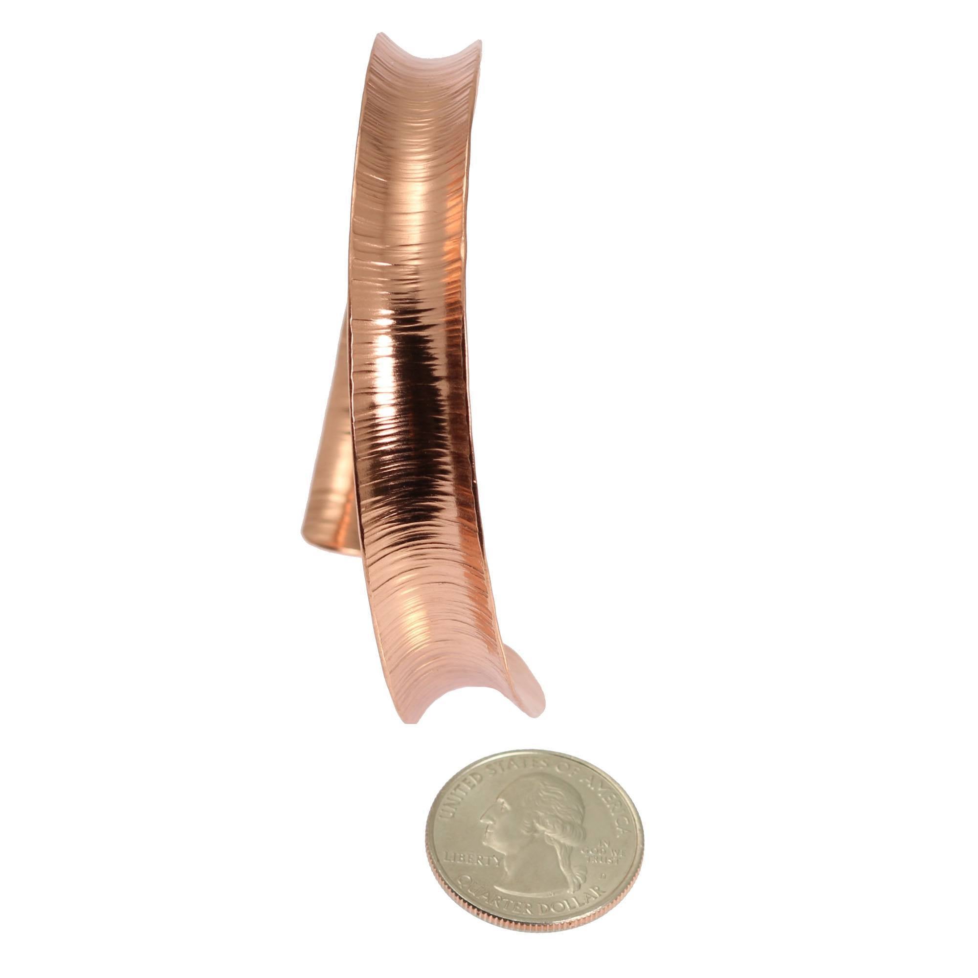 Size of Chased Anticlastic Copper Bangle Bracelet compared to a US Quarter Coin