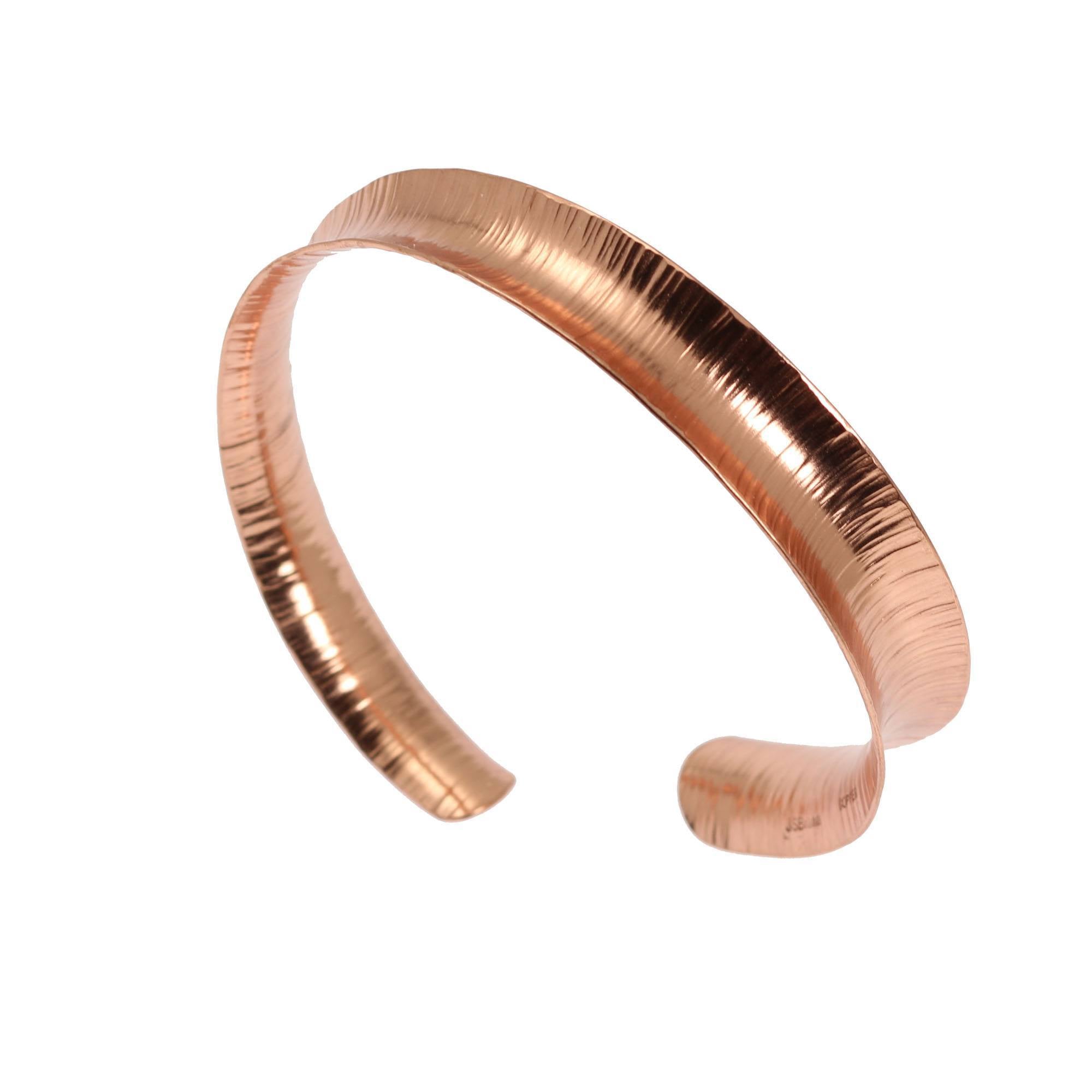 Detail View of Chased Anticlastic Copper Bangle Bracelet