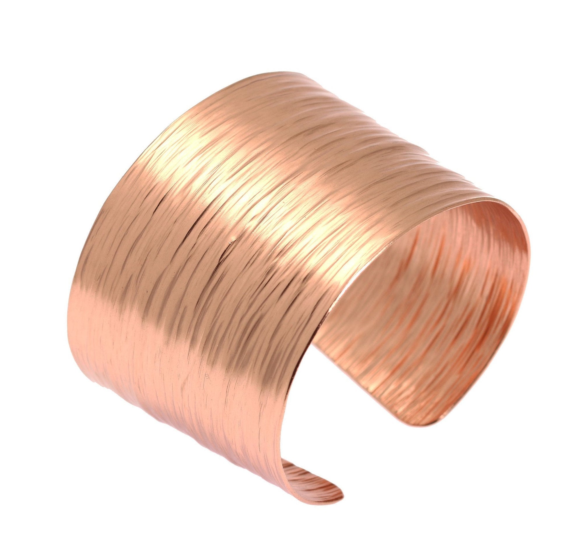 A Chased Copper Bark Cuff Bracelet on a White Background